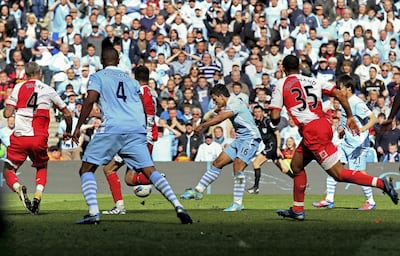 Sergio Aguero scores with virtually the last kick of the game against QPR to hand Manchester City their first Premier League title on May 13, 2012. Getty Images