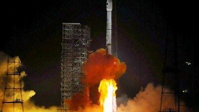 China's Long March rocket takes off, carrying Paksat-1R. Sun Zifa / Color China Photo / AP Images