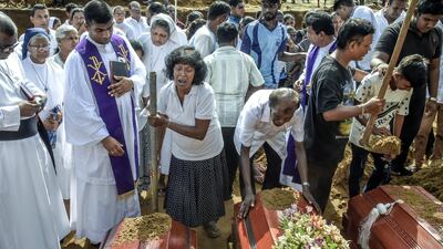 A mass burial in Katuwapity village in Negambo, Sri Lanka. Atul Loke / Getty Images