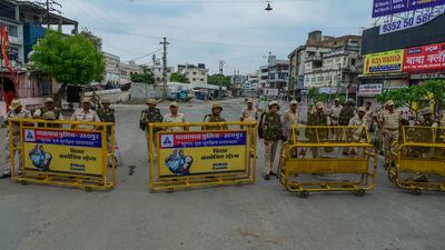 Security personal stand guard in a curfew-bound area in Udaipur, India, in June 2022. EPA