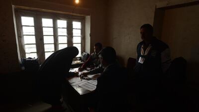 A Kashmiri Muslim woman casts her ballot at a polling station in Bijbehara, some 42 kms south of Srinagar. Indian Kashmir’s Anantnag constituency goes for voting in the country’s continuing elections on April 24, the first in the restive Himalayan valley of Kashmir where a separatist movement against Indian rule is centred. Tauseef Mustafa / AFP Photo