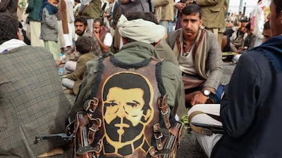 A supporter wears a vest with an image depicting Hussein Al Houthi, founder of the Houthi rebel movement, in Sanaa, Yemen. Reuters
