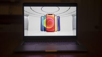 The Apple iPhone 12 is unveiled during a virtual product launch seen on a laptop computer in Tiskilwa, Illinois, U.S. Bloomberg