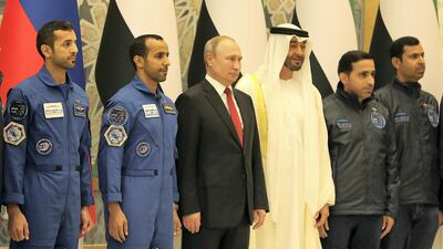 Mr Putin and the Crown Prince meet Emirati astronauts Hazza Al Mansouri and Sultan Al Neyadi. Pawan Singh / The National
