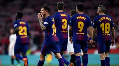 Philippe Coutinho celebrates after scoring from the spot for the Barcelona's fifth goal during their Copa del Rey final against Sevilla at the Wanda Metropolitano stadium in Madrid. David Ramos / Getty Images