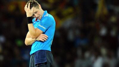 England bowler Chris Woakes reacts after a boundary during his side's ODI loss to Sri Lanka on Sunday in Colombo. Ishara S Kodikara / AFP / December 7, 2014