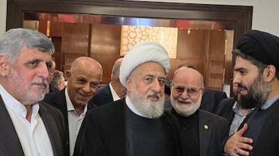 Mohammad Reza Sheibani, left, with Vice President of the Higher Islamic Shiite Council in Lebanon, Sheikh Ali Al Khatib, centre, at a memorial service at the Iranian embassy in Beirut. Photo: Iranian Embassy in Lebanon