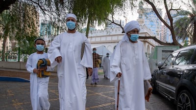 Worshippers after Eid Al Adha morning prayers at the mosque on Electra Street in Abu Dhabi.