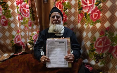 Abdul Hamid Mir, younger brother of Shafi Mohammad Mir, ensures the authenticity of the translation by sending copies to several Islamic scholars for validation. Photo: Wasim Nabi