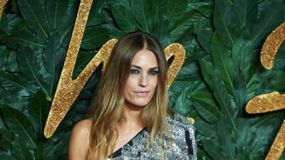 British model Yasmin Le Bon looks amazing in an asymmetric silver tasseled mini-dress . EPA