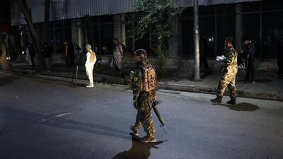 epa08461073 An Afghan security officer stands guard after a suicide bomber blew himself up inside the compound of Wazir Akber Khan Mosque in Kabul, Afghanistan on 02 Jun 2020. According to the police officials, two people were killed and two others were injured when a suicide bomber blew himself up in the part of the compound where worshippers wash before entering the main complex to pray. EPA/HEDAYATULLAH AMID