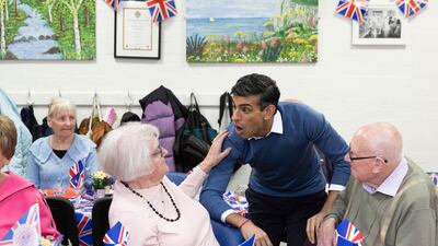 Prime Minister Rishi Sunak visited a community group's lunch club on Monday, as part of the 'Big Help Out' to mark the coronation. AP