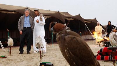 U.S. President George W. Bush listens to the Crown Prince of Abu Dhabi, His Highness General Sheikh Mohammed bin Zayed Al Nahyan as Sheikh Mohammed bin Rashid Al Maktoum and Condoleezza Rice look on at a private dinner in the desert, on 13 January 2008. Photo by Philip Cheung / The National