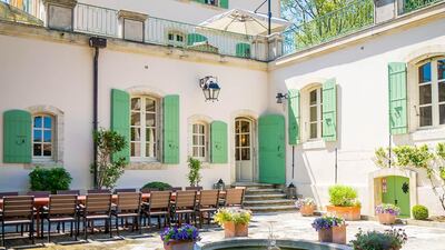 Relax in the sunshine al fresco. Courtesy Chateau De Tourreau