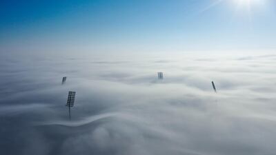 Zayed Cricket Stadium in Abu Dhabi shrouded in fog ahead of the UAE's one-day international against Ireland on Monday, January 18. Courtesy Abu Dhabi Cricket