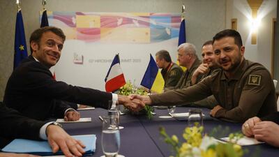 Ukraine's President Volodymyr Zelenskyy, right, and France's President Emmanuel Macron during their meeting on the sidelines of the G7 Summit in Hiroshima. AFP