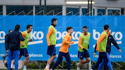 Barcelona's players take part in a training session. AFP
