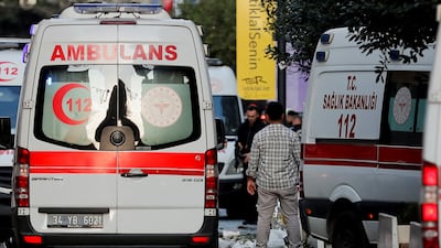 Ambulances and police at the scene of the explosion. Reuters