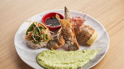 Crispy sea bass with wasabi-potato puree, steamed rice and stir-fried vegetables.