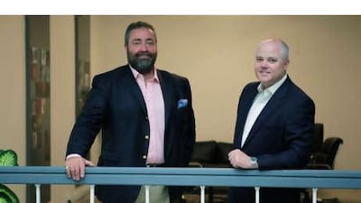 Philip Kantor, left, and James Knight can both thank their fathers for leading them to a career in classic cars.