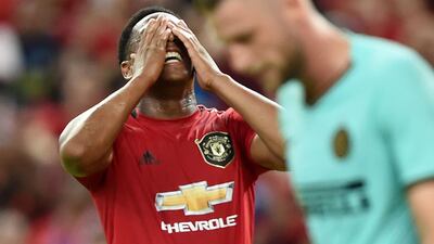 Anthony Martial reacts after missing a scoring opportunity. AFP