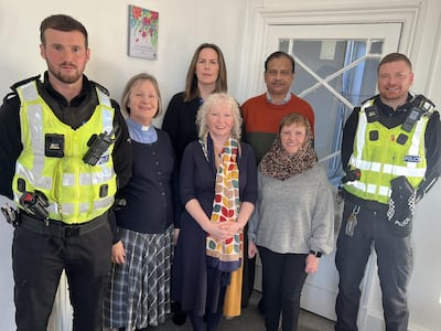Melanie Ward, centre of back row, visited Kirkcaldy Islamic Centre after racist threats were made. Melanie Ward / Facebook