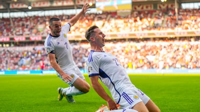 Kenny McLean, right, of Scotland celebrates after scoring the second goal in the Euro 2024 qualifying match against Norway in Oslo on Saturday, June 17, 2023. EPA