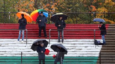 Spectators watched as the first practice session for the Eifel GP was cancelled. Reuters