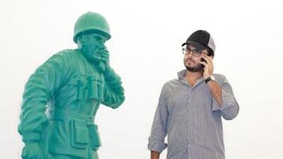 Gallery owner Rami Farook with the work of James Clar at Traffic art gallery.