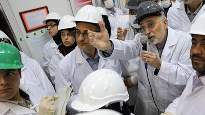 Ali Akbar Salehi speaks with the media at Natanz enrichment facility, in central Iran. AP