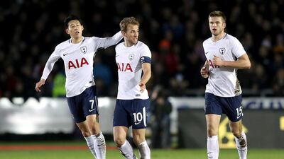 Harry Kane, centre, came to Tottenham Hotspur's rescue with the equalising goal in their 1-1 draw at Newport County on Saturday. Andrew Matthews / PA via AP