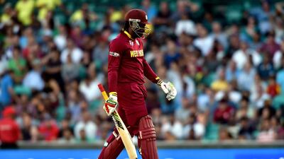 West Indies batsman Chris Gayle walks back to the pavilion following his dismissal during the 2015 Cricket World Cup Pool B match between South Africa and the West Indies at the Sydney Cricket Ground on February 27, 2015. AFP PHOTO / Saeed KHAN