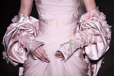 Haute couture outfits typically take hundreds of man-hours. AFP