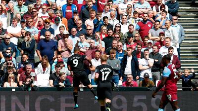 Jesus celebrates scoring City's first league goal of the season. AFP