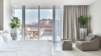 Calming bedroom decor. Courtesy Luxhabitat Sotheby's International Realty