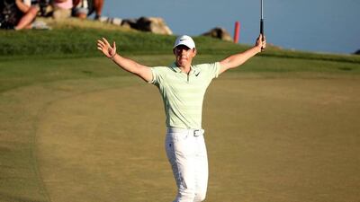 Rory McIlroy celebrates after sinking a birdie putt on the 18th green to win the Arnold Palmer Invitational. Stephen M Dowell / Orlando Sentinel via AP