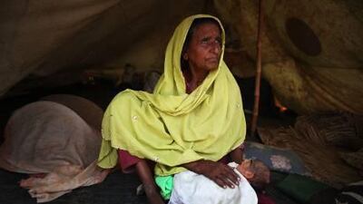 Parents displaced by Pakistan's floods reveal the joy and heartache of their babies being born after the deluge drove them from their homes.
