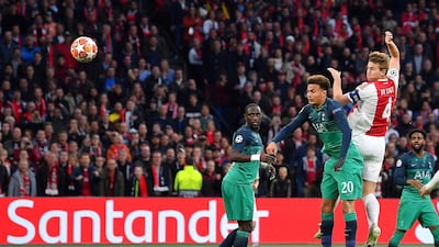 Matthijs de Ligt heads home Ajax's first goal. Getty
