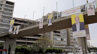 Campaign posters for Lebanon's May 6 parliamentary election in the industrial zone of Dora on the northern outskirts of Beirut. Anwar Amro / AFP