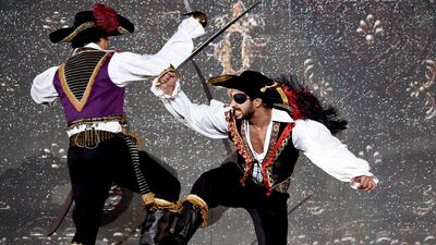 Bollywood actors Shahid Kapoor, right, and Farhan Akhtar performs as they host the fourth and final day of the 15th International Indian Film Academy (IIFA) Awards. Jewel Samad / AFP