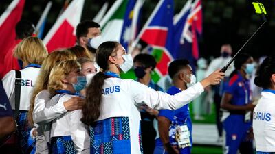 Belarus's athletes enter the stadium during the closing ceremony.