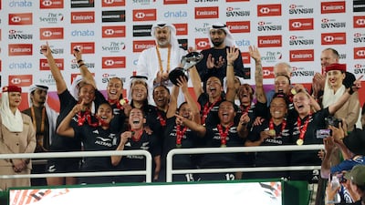 New Zealand players celebrate following their win over Australia at the Dubai Sevens
