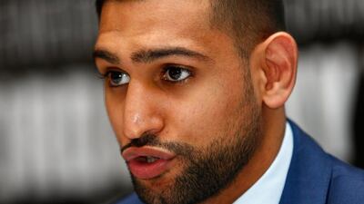 Amir Khan talks to the media during a press conference to preview his fight against Canelo Alvarez. Julian Finney / Getty Images / February 29, 2016