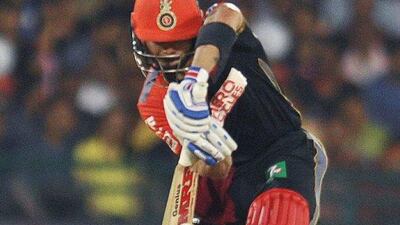 Royal Challengers Bangalore captain Virat Kohli plays a shot during the 2016 Indian Premier League (IPL) Twenty20 cricket match between Delhi Daredevils and Royal Challengers Bangalore at Shaheed Veer Narayan Singh International Cricket Stadium,Raipur on May 22, 2016. Noah Seelam / AFP