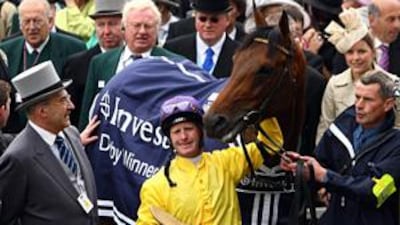 Sea The Stars and rider Mick Kinane celebrate winning the Epsom Derby this summer, one of the horse's six Group One victories this year.