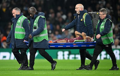 Manchester City winger Savinho is carried off on a stretcher during their League Cup defeat at Tottenham Hotspur. Getty Images