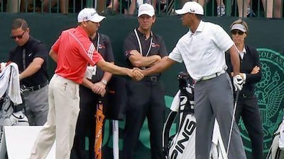 Sergio Garcia, left, and Tiger Woods shook hands and then came out swinging ... on the practice greens in preparation for the US Open at Merion Golf Club in Pennsylvania.