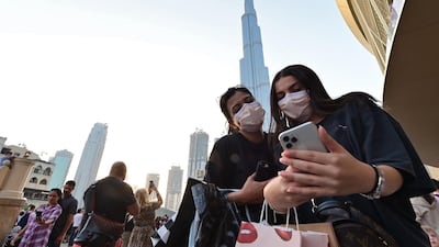 A selfie in front of Burj Khalifa, Dubai, March 8, 2020. AFP