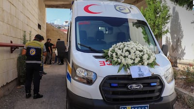 A funeral procession for Mohammad Ghamira departs a hospital in Latakia. Photo: Sana