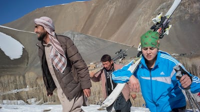 Nazima and her father (left) make their way up to the challenge. Rick Findler for The National